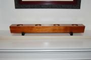 A candle holder made from pallet material, of an unknown tropical hardwood & Ebony