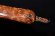 A Copper Royal Wullf inlaid into fragrant Thuya Burl.