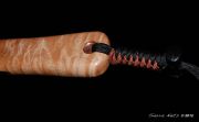 Cat's Paw Burl Maple with copper inlaid into the open burl eyes. The hoop is Wenge and all accents a