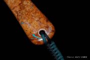 Carolina Cherry Burl with a Wenge spine for strength. The hoop is Wenge. Inlaid turquoise & Copper.